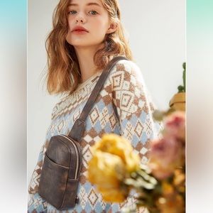 Reversible sling bag